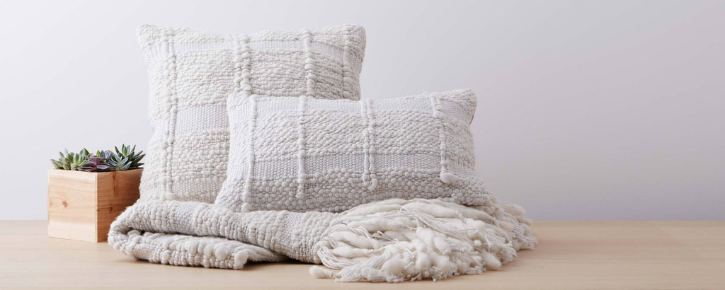 ilght grey vertebra pillows and throw
