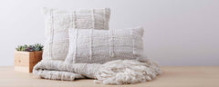 ilght grey vertebra pillows and throw