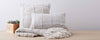 ilght grey vertebra pillows and throw
