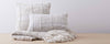 ilght grey vertebra pillows and throw