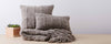 grey vertebra pillows and throw