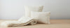 llama boucle pillows and throw