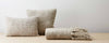 seba light gray pillows and throw