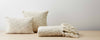 natural gray pillows and throw