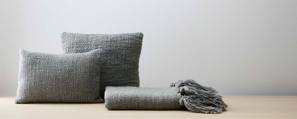 seba dark gray pillows and throw